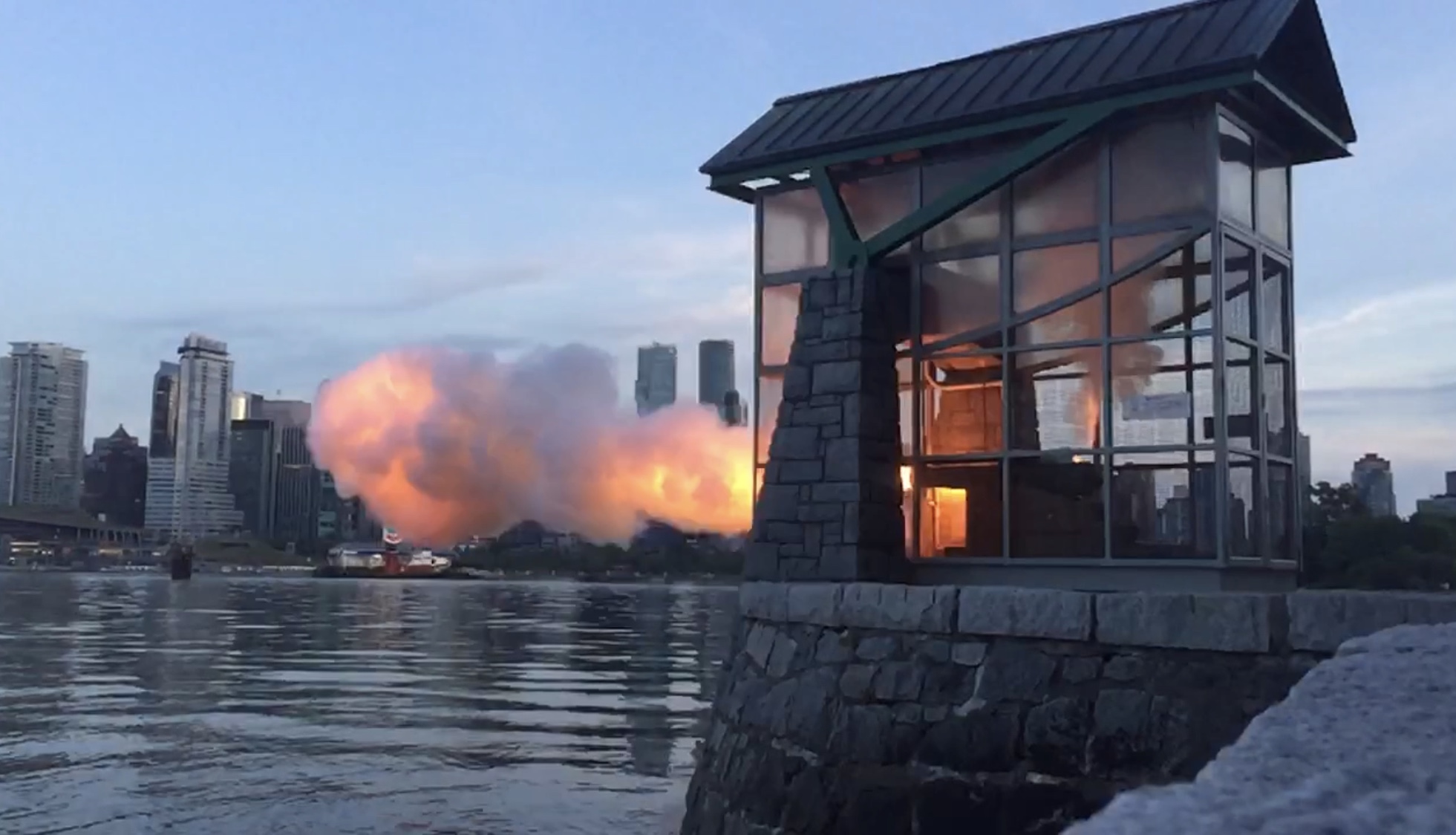 The Nine O'Clock Gun firing over Burrard Inlet, Vancouver
